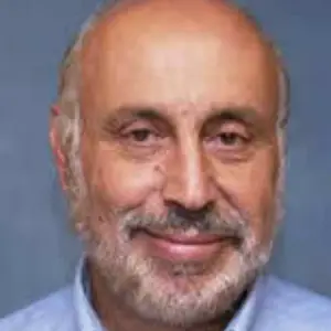 headshot of Miguel José Yacamán